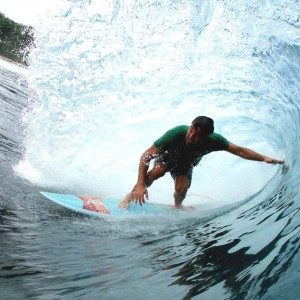 Nate Harris barrel at Thunders on an Album surfboard