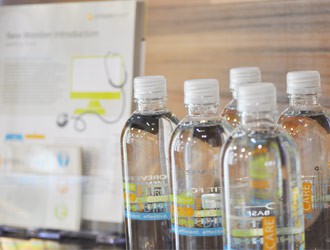 Crossover Health water bottles and branded collateral